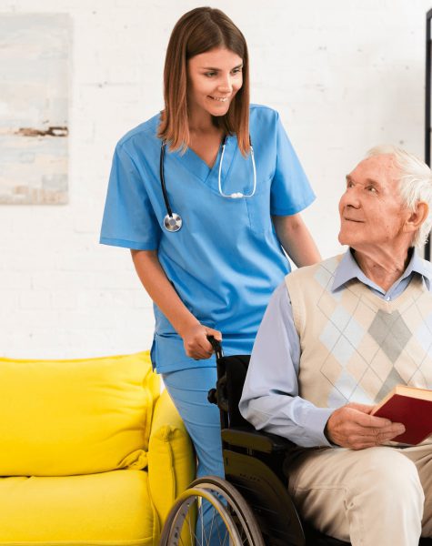 old-man-sitting-wheelchair-while-talking-nurse-min